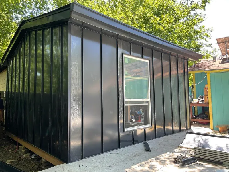 Black standing seam metal wall panels for Metal Roof Installation in St. Peters